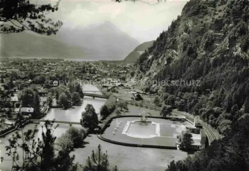 AK / Ansichtskarte INTERLAKEN BE Strandbad Schwimmbad Freibad Luftaufnahme Berge Aare Ortschaft Felsen