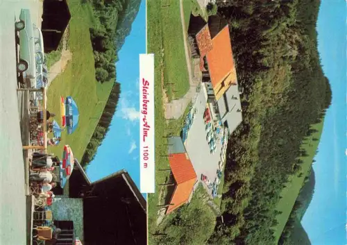 AK / Ansichtskarte Steinberg-Alm 1265m Ruhpolding Bayern Steinberg-Alm Berggasthof Luftaufnahme Terrasse Sonnenschirme Parkplatz Berge Wald