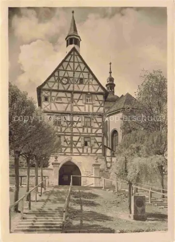 AK / Ansichtskarte Burgbernheim Neustadt Aisch-Bad Windsheim Bayern Stadttor Fachwerk Kirchentor Treppe Baeume Turm Mittelfranken Torbogen