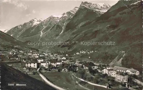 AK / Ansichtskarte Mesocco Misox MOESA GR Berge Schneeberge Dorf Talansicht Haeuser Strasse