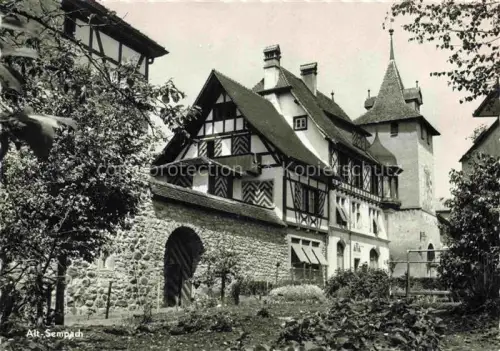AK / Ansichtskarte Sempach LU Alt-Sempach Stadttor Fachwerkhaus Turm Stadtmauer Torbogen Garten