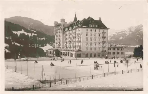 AK / Ansichtskarte Gstaad Saanen BE Royal-and-Winter-Palace-Hotel Eisbahn Wintersport Berge Schnee Curling