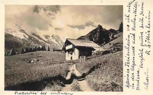 AK / Ansichtskarte Muerren BE Roseraeli Almhutte Bergwiese Berge Schnee Wolken Wald Pfad