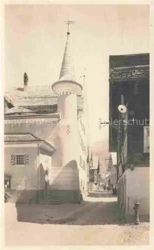 AK / Ansichtskarte Andermatt UR Dorfpartie Turm Gasse Altstadt Hauser Kopfsteinpflaster
