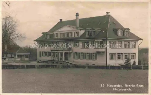 AK / Ansichtskarte Niederbipp BE Bezirks-Spital Hinteransicht Krankenhaus Gebaeude Wiese Baeume