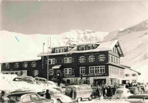 AK / Ansichtskarte Malbun Triesenberg Liechtenstein Alpen-Hotel-Malbun Sareiserjoch Hotel Restaurant Wintersport Ski Autos Schnee Berge