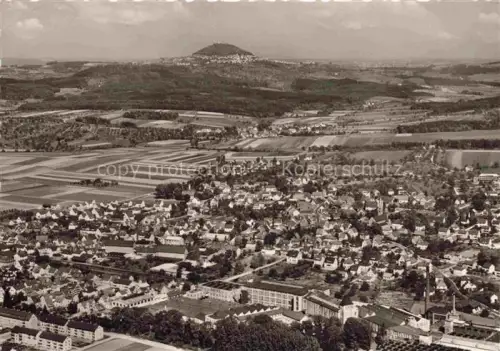 AK / Ansichtskarte Salach Goeppingen BW Fliegeraufnahme Ortschaft Felder Industriegebaeude Kirche Huegelkuppe