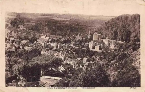 AK / Ansichtskarte Le Monteil-au-Vicomte AUBUssON 23 Creuse Stadtpanorama Kirche Tal Huegel Wald Daecher