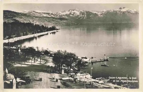 AK / Ansichtskarte Ouchy LAUSANNE VD Quai Genfersee Alpes-Vaudoises Berge See Boote Promenade Baeume Schnee