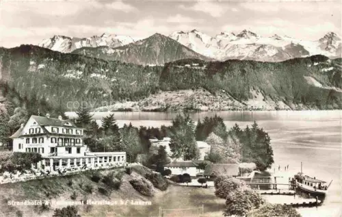 AK / Ansichtskarte LUZERN  LU Strandhotel-Hermitage Restaurant See Dampfer Berge Wald Ufer Seeburg