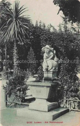 AK / Ansichtskarte LUZERN  LU Nationalquai Brunnen Kinderfigur Skulptur Fass Palme Park Baeume