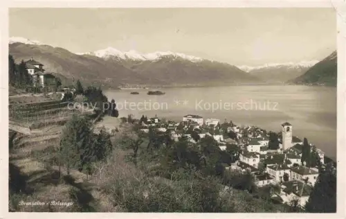 AK / Ansichtskarte Brenscino Brissago Lago Maggiore TI Brenseino Lago-Maggiore See Berge Schnee Kirchturm Dorf Ferienheim Isole-di-Brissago
