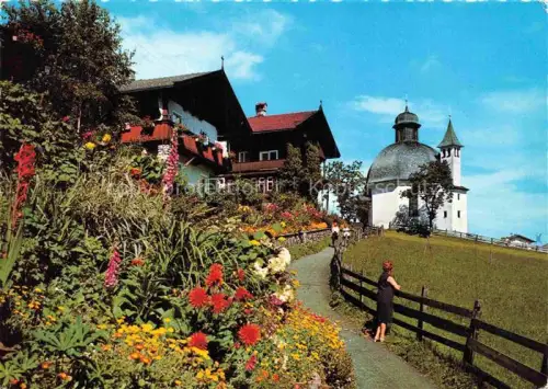 AK / Ansichtskarte Oberau Tirol Wildschoenau Tirol AT Antonius-Kapelle Hochtal Wildschoenau Bauernhaus Blumengarten Sommerfrische