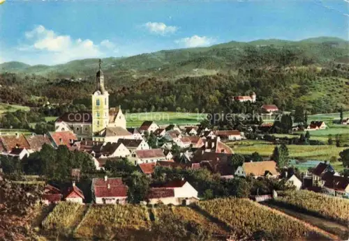 AK / Ansichtskarte Leutschach Ortsansicht Kirche Weinberg Huegellandschaft Dorf