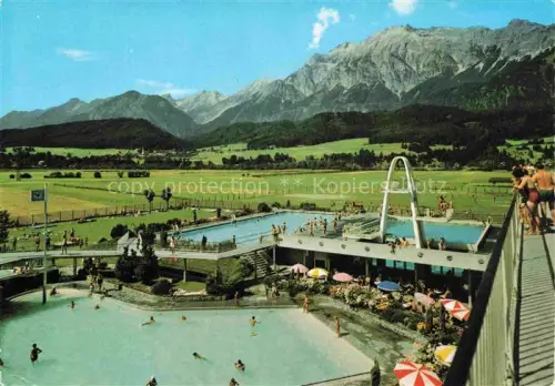 AK / Ansichtskarte Wattens Fritzens Tirol AT Alpenbad Bettelwurf Schwimmbad Badegaeste Berge Sprungbrett Sonnenschirme