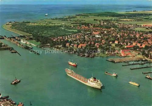 AK / Ansichtskarte Brunsbuettelkoog Schleuse Hafen Frachtschiffe Kanal Elbe Ortschaft Luftbild