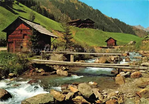 AK / Ansichtskarte Innervillgraten Osttirol AT Villgratental Wassermuehlen Bach Bruecke Almhuetten Berge Wald Steine
