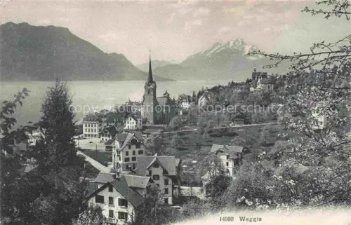 AK / Ansichtskarte Weggis Vierwaldstaettersee LU Kirche Vierwaldstaettersee Pilatus Haeuser Bergpanorama Ortschaft
