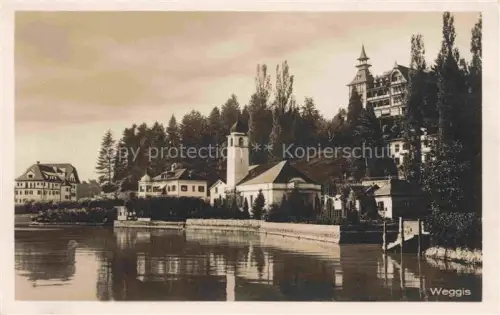 AK / Ansichtskarte Weggis Vierwaldstaettersee LU Kirche Vierwaldstaettersee Hotel Spiegelung Haeuser Baeume