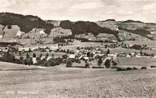 AK / Ansichtskarte Hasle Entlebuch Luzern LU Dorf Kirche Huegel Felder Wald Panorama