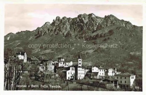 AK / Ansichtskarte Sonvico LUGANO TI Denti-della-Vecchia Dorf Kirche Berge Felsen Gesamtansicht Wohnhaeuser