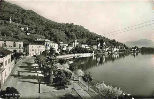 AK / Ansichtskarte Ponte-Tresa Lago di Lugano TI Fluss Uferpromenade Haeuser Berge See Bruecke