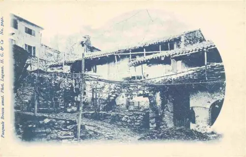 AK / Ansichtskarte LOCARNO Lago Maggiore TI Ruinen Mauerwerk Holzgalerie Arkaden Dorf Berge alte-Gebaeude