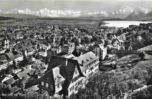 AK / Ansichtskarte Biel Bienne BE Stadtansicht Alpen Bielersee Daecher Kirche Vorort