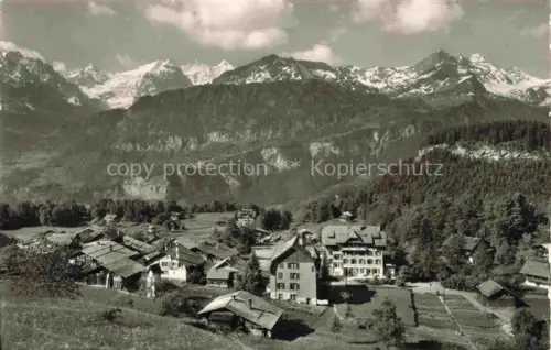 AK / Ansichtskarte Hasliberg Hohfluh Wetterhoerner Bergdorf Alpen Hotel Haeuser Berglandschaft