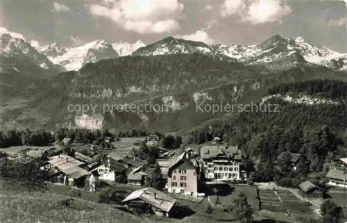 AK / Ansichtskarte Hasliberg Hohfluh Wetterhoerner Bergdorf Alpen Hotel Haeuser Berglandschaft