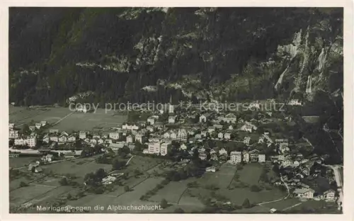 AK / Ansichtskarte Meiringen Oberhasli BE Alpbachschlucht Kirche Stadtansicht Felsen Wasserfall