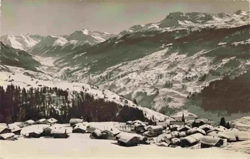 AK / Ansichtskarte Pany-Luzein Praettigau-Davos GR Silvrettagruppe Pischahorn Casanna Parsenn Bergdorf Winterpanorama Schnee Kirche
