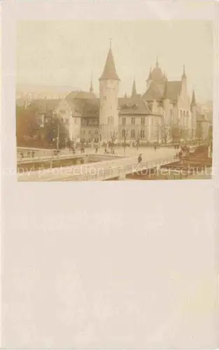 AK / Ansichtskarte ZueRICH  ZH Landesmuseum Historismus Turm Bruecke Passanten Baeume Kanal Stadtansicht