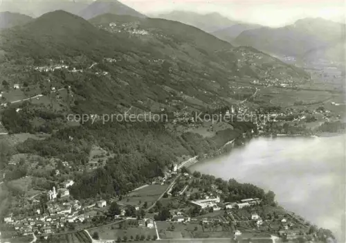 AK / Ansichtskarte Magliaso Lugano TI See Berge Ortschaft Wald Tallandschaft Aerofoto