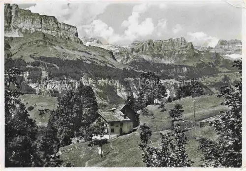 AK / Ansichtskarte Linthal  GL Kurhaus-Obbort Ortstock Bergpanorama Felsen Alpe Wiese Chalet