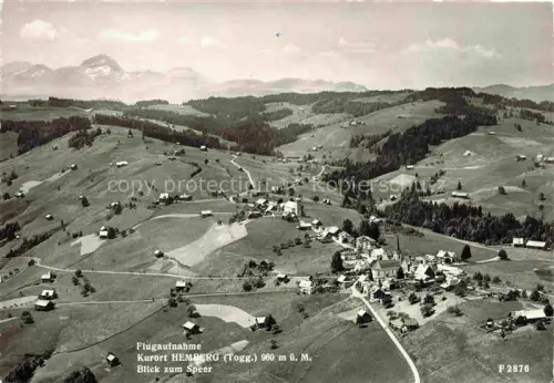 AK / Ansichtskarte Hemberg Toggenburg SG Fliegeraufnahme Kurort Speer Toggenburg Kirche Wiesen Huegel Bergpanorama