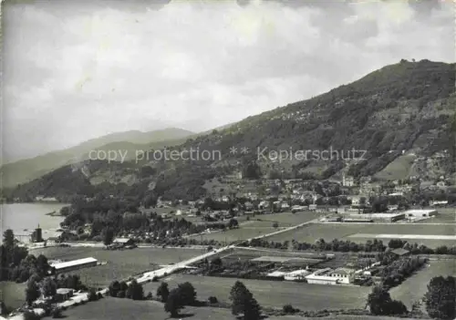 AK / Ansichtskarte Agno Maglasio Lago di Lugano TI Lago-di-Lugano See Huegel Stadtansicht Felder Baeume Tessin