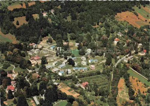 AK / Ansichtskarte Hinterbruehl Niederoesterreich AT SOS-Kinderdorf Wohnhaeuser Wald Huegel Gaerten Felder