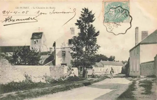 AK / Ansichtskarte Le Puiset CHARTRES 28 Eure-et-Loir Chemin-du-Boële Dorfstrasse Passanten Kirche Mauern Baeume Schornstein