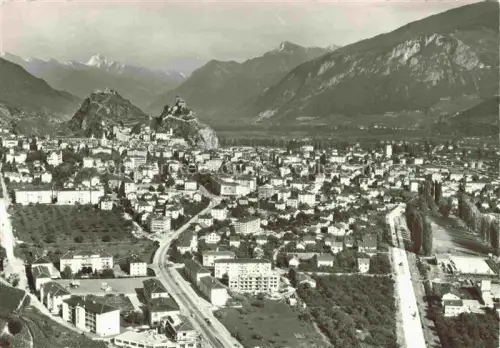 AK / Ansichtskarte SION  Sitten Seduno VS Burg-auf-Fels Stadtpanorama Rhonetal Alpen Berge Weinreben Strassen