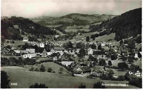 AK / Ansichtskarte Brunnadern Toggenburg SG Dorfansicht Kirche Viadukt Huegel Wiesen Wohnhaeuser Toggenburg