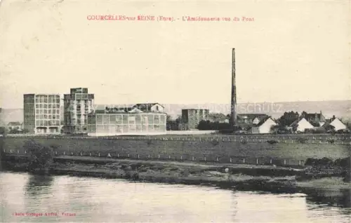 AK / Ansichtskarte Courcelles-sur-Seine LES ANDELYS 27 Eure Amidonnerie Fabrik Schornstein Seine Fluss Pont Industrieanlage