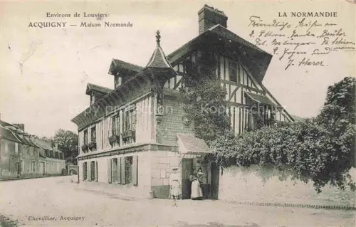 AK / Ansichtskarte Acquigny Les Andelys 27 Eure Maison-Normande Fachwerkhaus Dorfstrasse Baeume Passanten Louviers