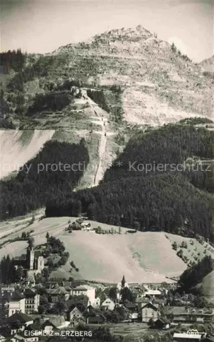 AK / Ansichtskarte Eisenerz Steiermark AT Erzberg Bergbau Tagebau Stadtblick Kirche Wald Berge