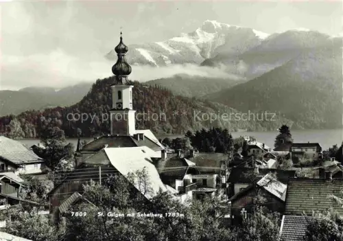 AK / Ansichtskarte Sankt Gilgen Kirche Zwiebelturm Schafberg Wolfgangsee Ortschaft Berge Wald