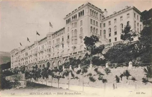 AK / Ansichtskarte MONTE-CARLO MONACO Hôtel-Riviera-Palace Hotel Flaggen Palmen Gartenanlage Belle-Epoque