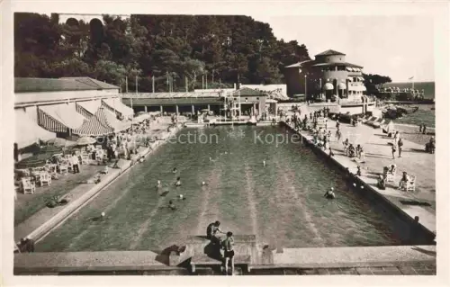 AK / Ansichtskarte MONTE-CARLO MONACO Beach Piscine-Olympique Schwimmbecken Badende Sonnenschirme Strand