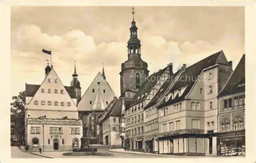 AK / Ansichtskarte Eisleben Markt Rathaus Kirche Kirchturm Fachwerk Geschaefte Denkmal Marktplatz