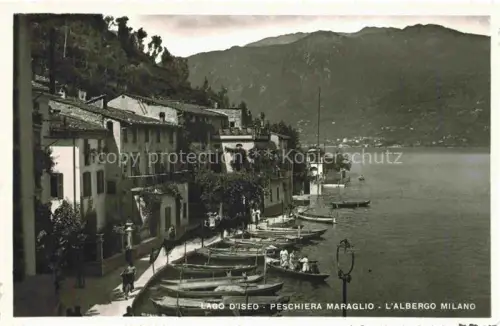 AK / Ansichtskarte Preschiera Maraglio Lago d Iseo TI Lago-d Iseo Albergo-Milano Boote Uferpromenade Berge See