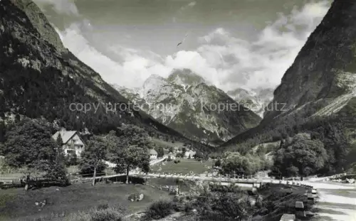 AK / Ansichtskarte Trenta Soca Slovenia Bergtal Alpen Haeuser Wiesen Fluss Wald Gipfel
